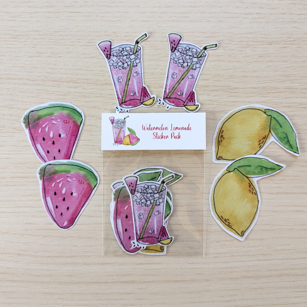A sticker pack featuring watermelon slices, lemons, and pink lemonade illustrations arranged on a light wood background with a small label reading 'Watermelon Lemonade Sticker Pack'.